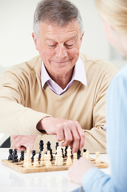 man playing chess as a relaxation