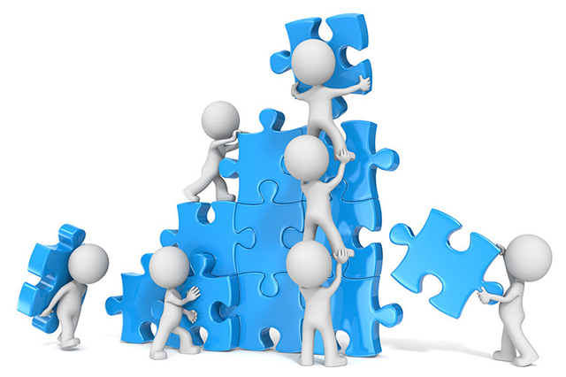 pieces of a jigsaw being joined by workers vector image